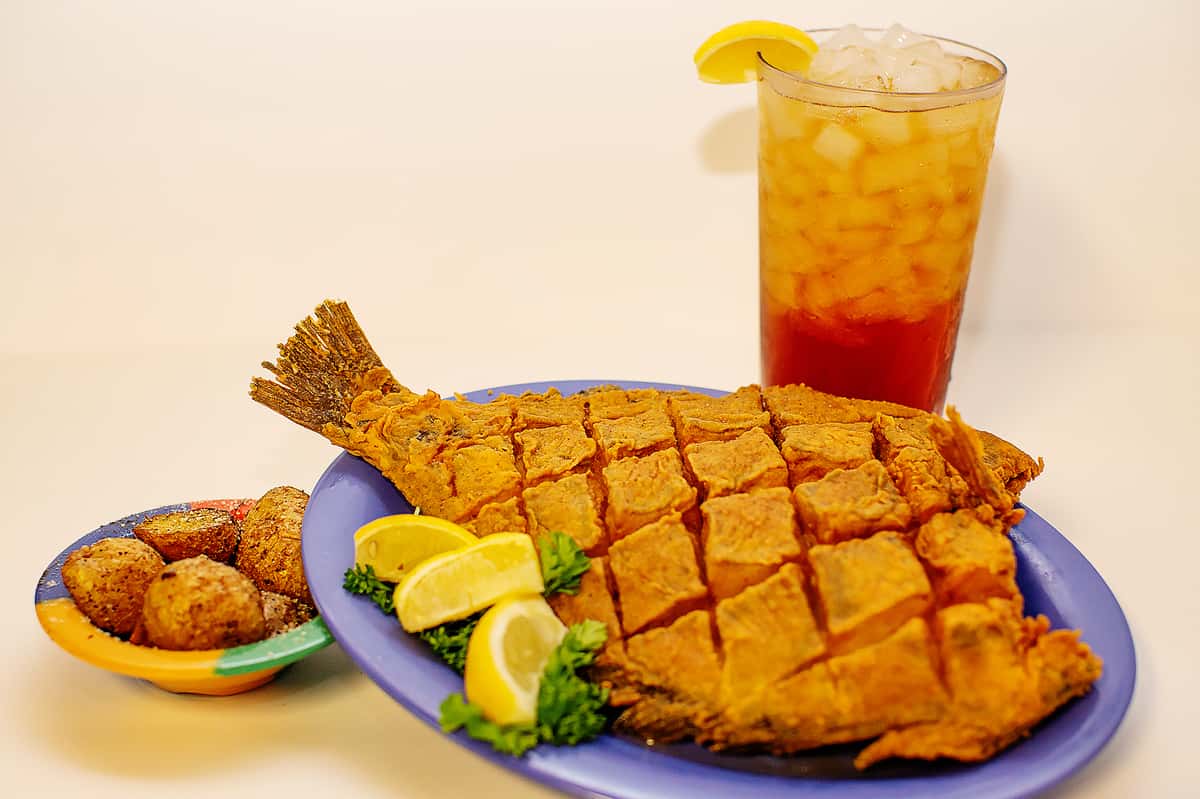 fried flounder with sides and iced tea