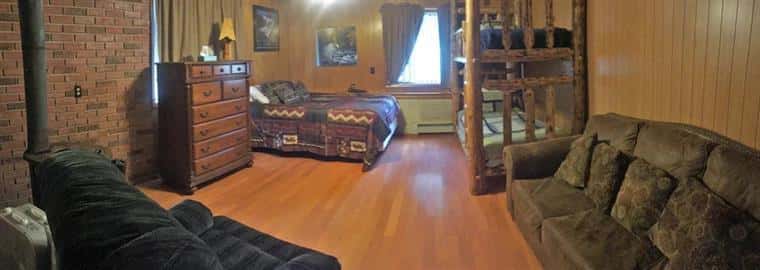 lower unit with dresser, bunk beds, and couches