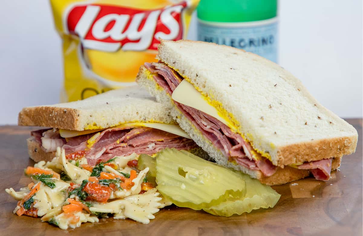 CORNED BEEF & SWISS ON RYE W/SALAD Menu Butch's Grinders Sandwich