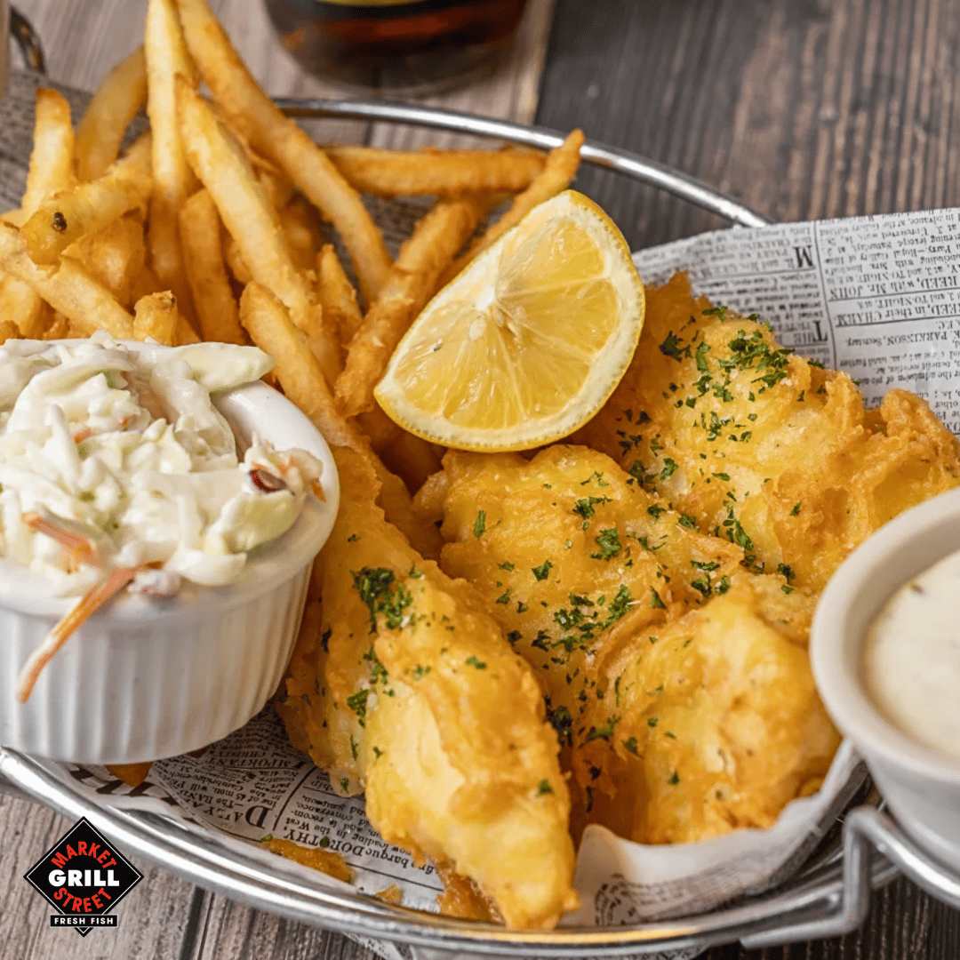 Dive into a true seafood classic with Market Street Grill & Oyster Bar's Cod Fish 'N' Chips. 🍤