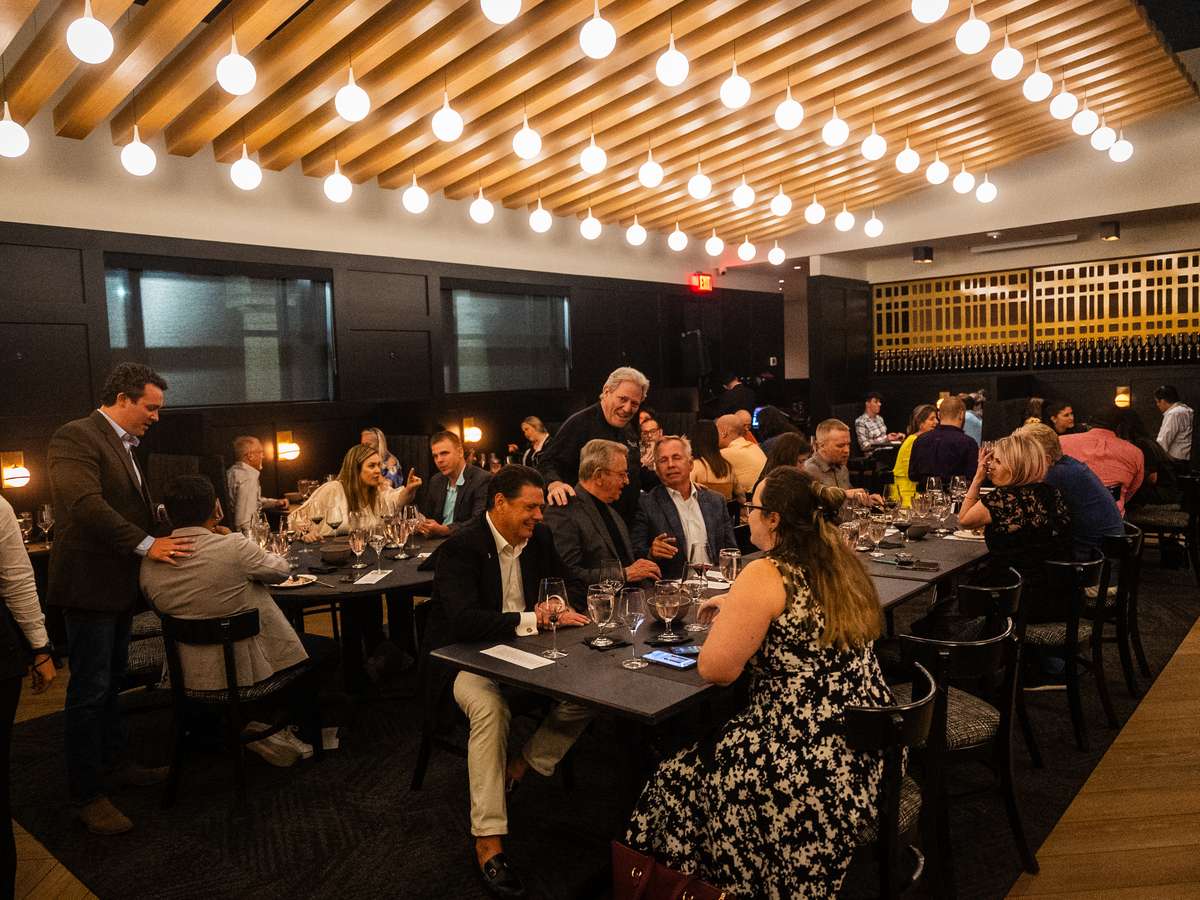 Diners enjoying food at The Chef's Table