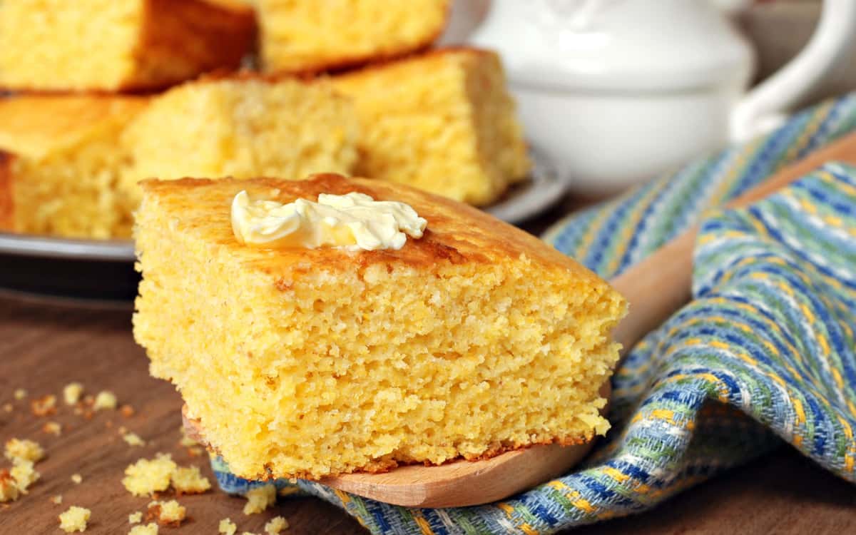 cornbread square with a pat of butter