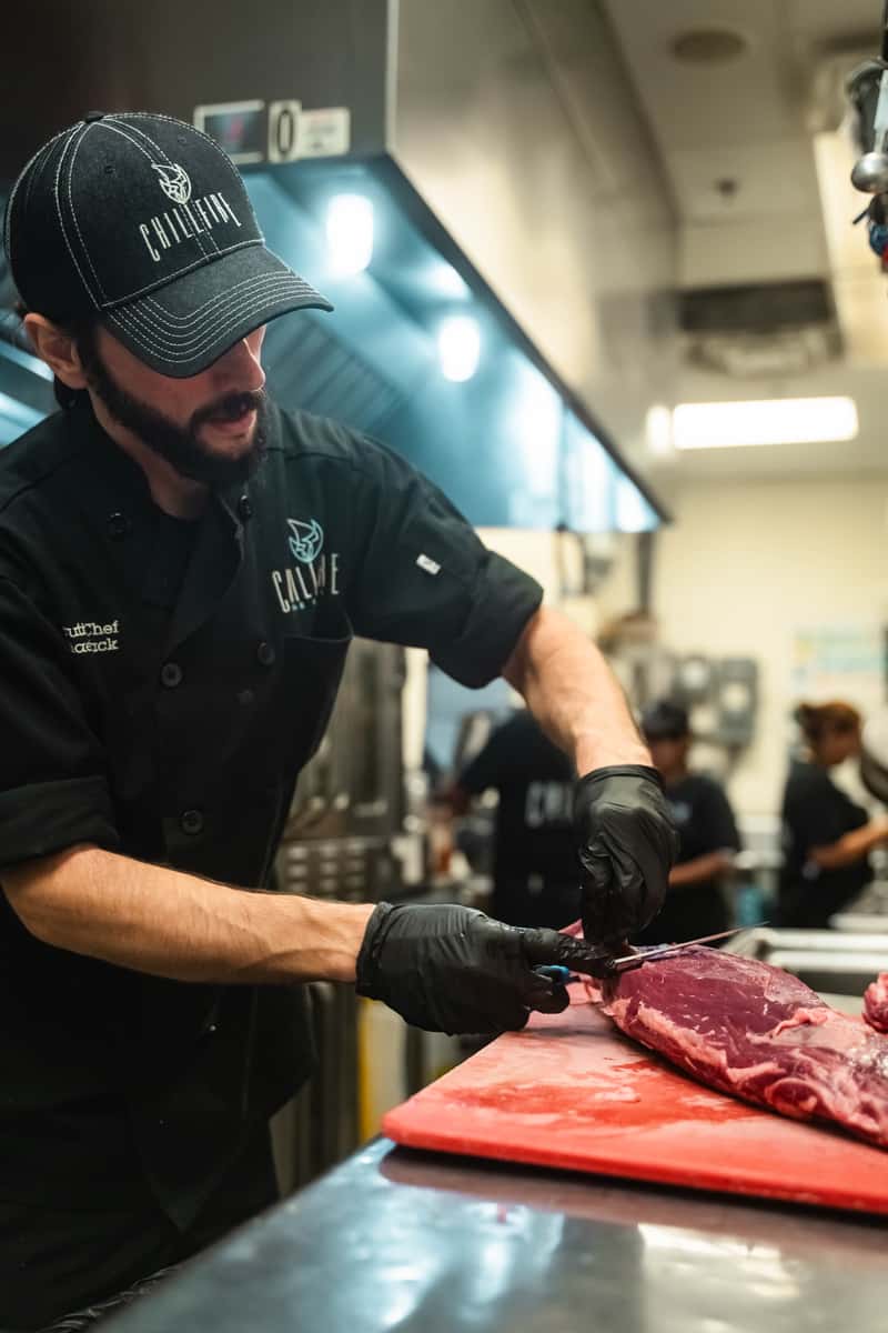 Chef Michael Butchering filet mignon in house1