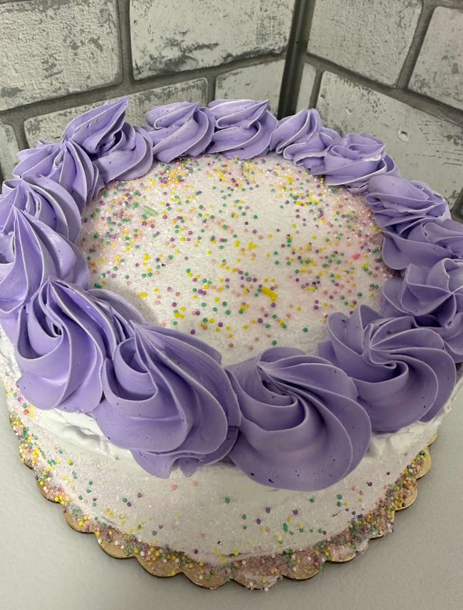 lavender icing cake with sprinkles
