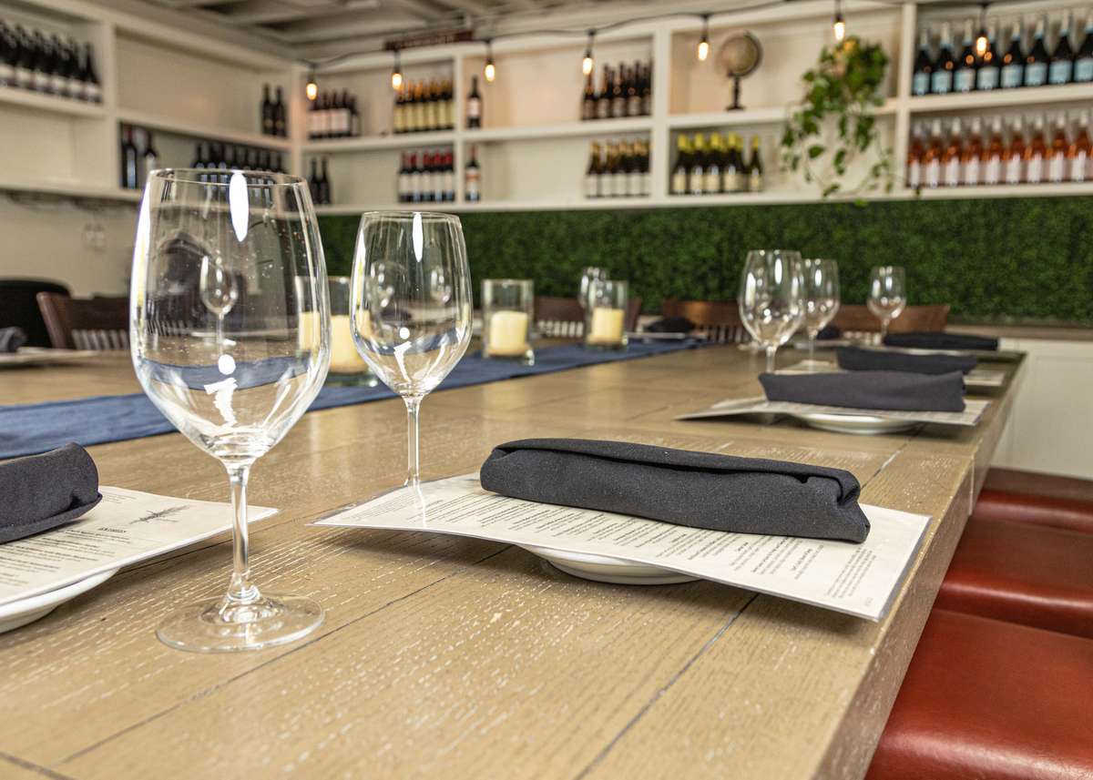 Table settings with glasses and napkins