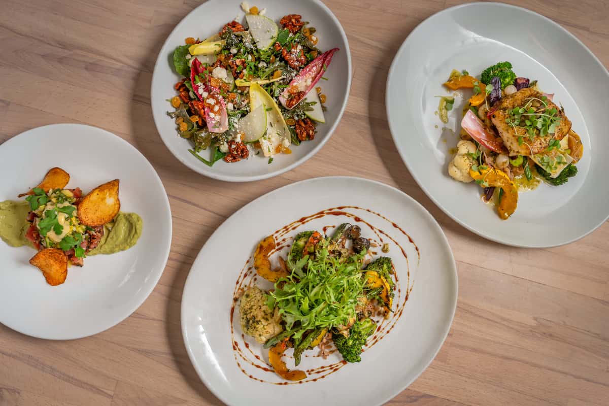A variety of plated meals on a table