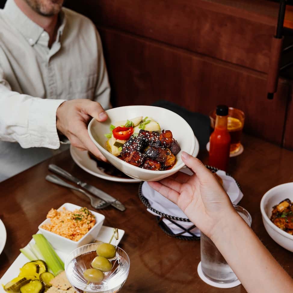 Passing food across the table