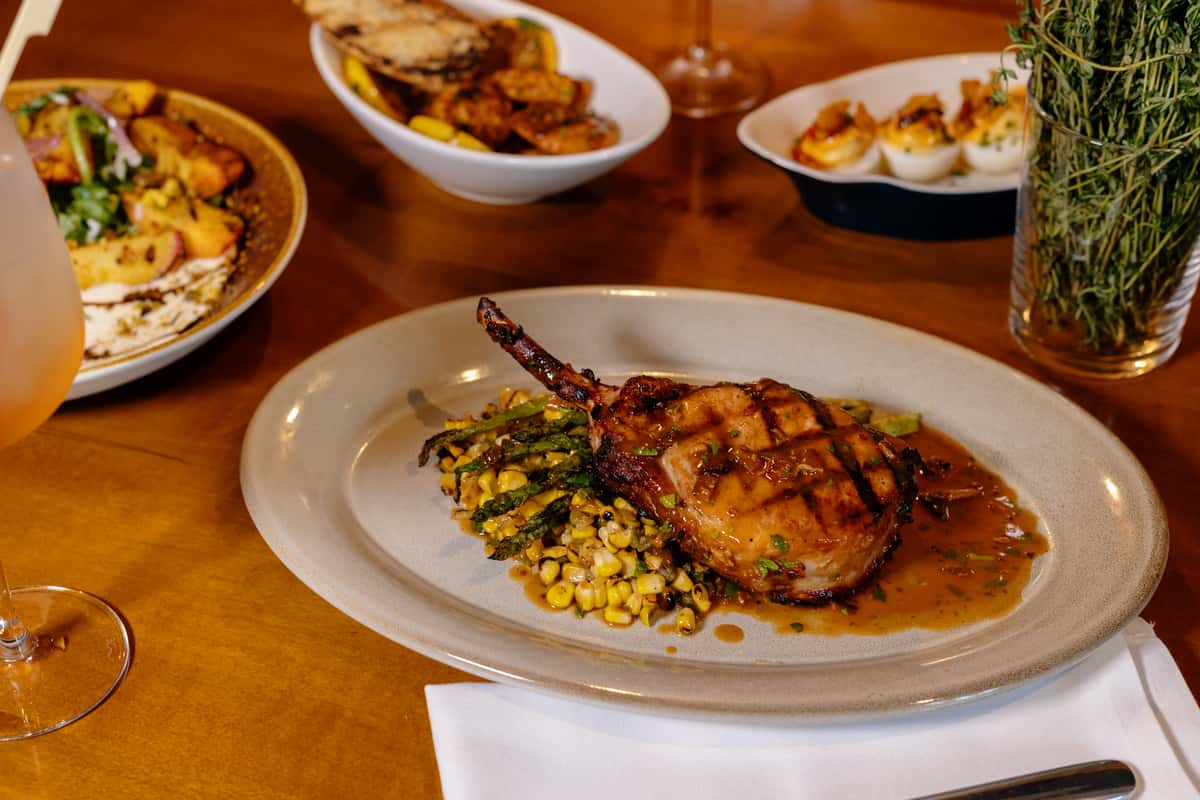 Smoky Grilled Pork Chop South City Kitchen Refined Southern