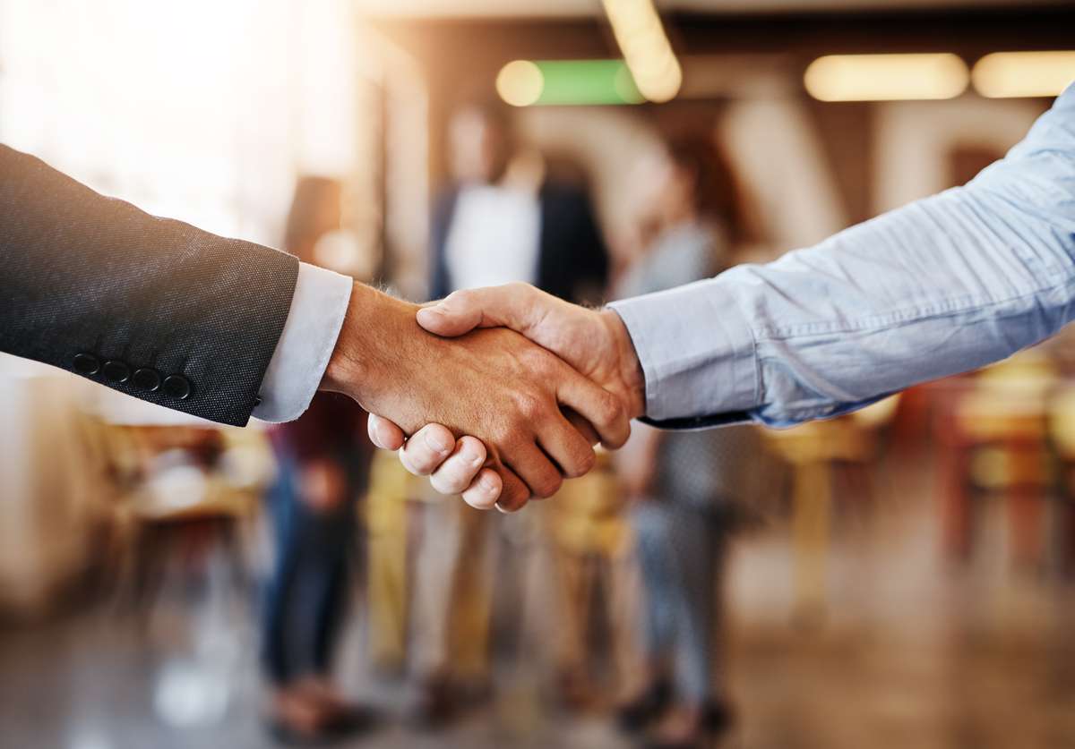 Business people shaking hands