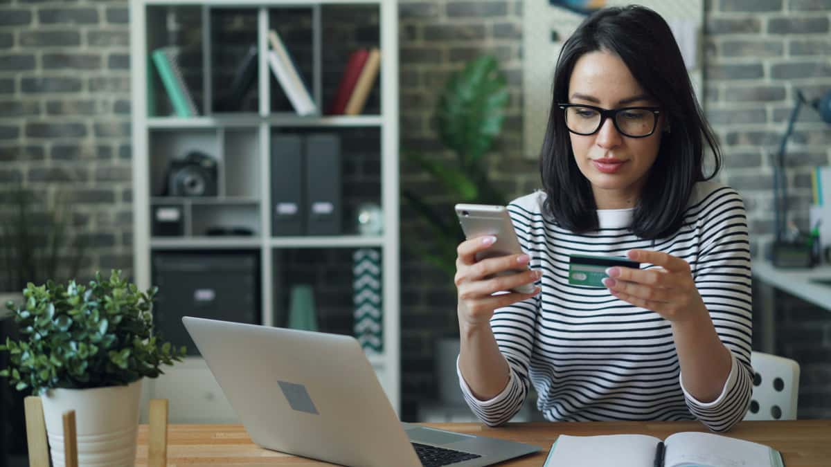 Woman handling a credit card