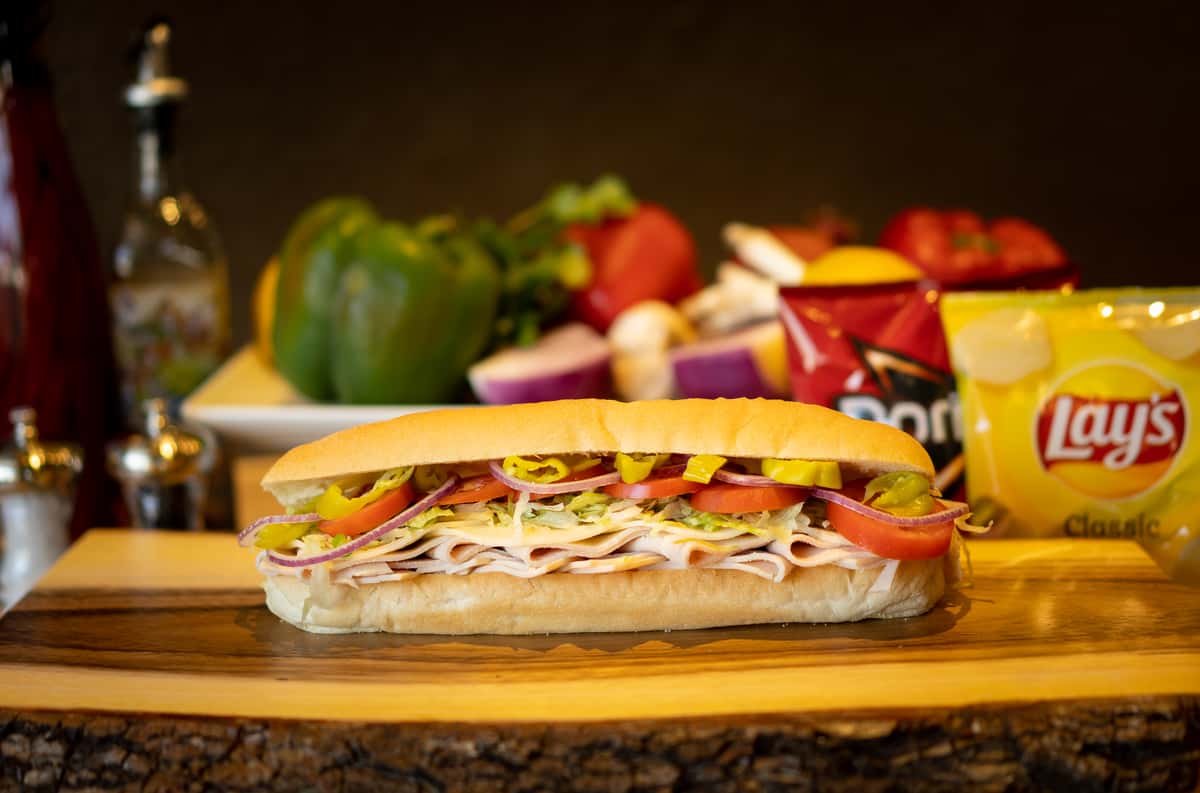 Turkey, Provolone, Lettuce, Tomatoes, Onions, Pepperoncinis, Oil & Vinegar