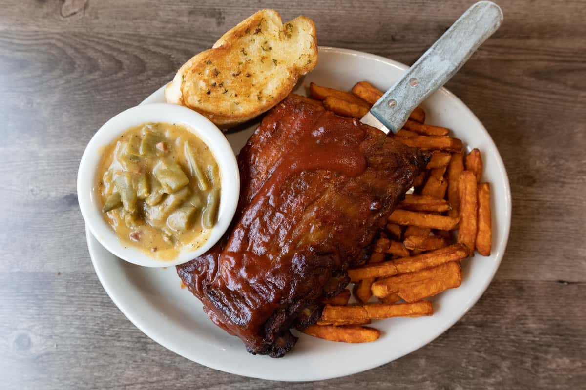 Half rack ribs with beans and sweet potato fries