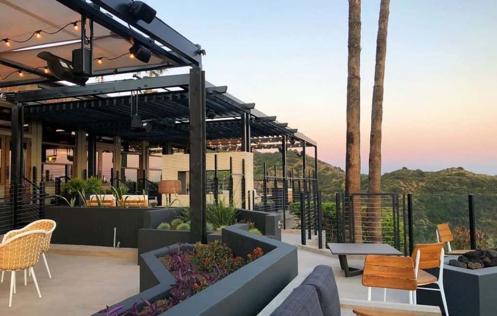 Outdoor scenic view of the sunset with patio dining