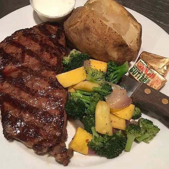 Steak, potatoes, vegetables, butter