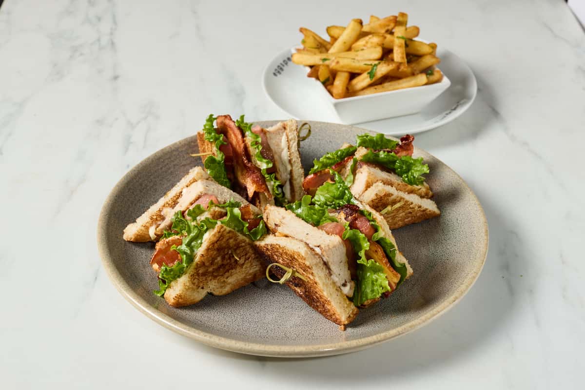 Club sandwich with french fries