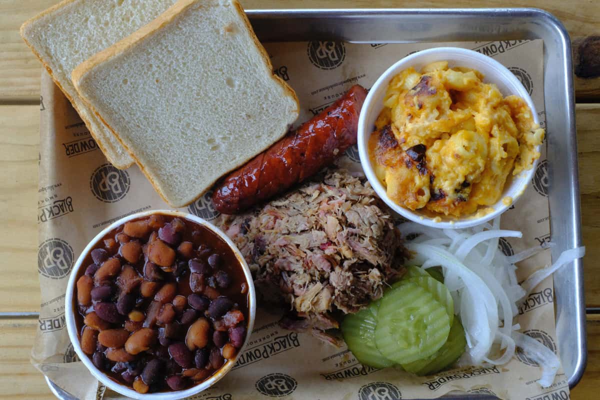 smoked meats, mac and cheese, beans and bread