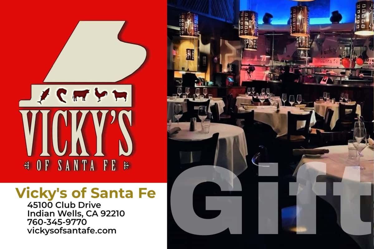 photo of gift card front with the word GIFT large dropping out over main dininng photo large vicky's logo in red with address and phone number under