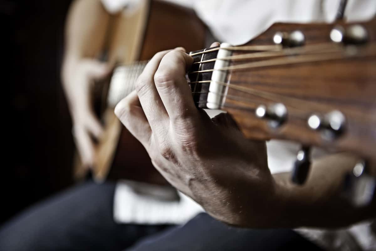 person playing guitar