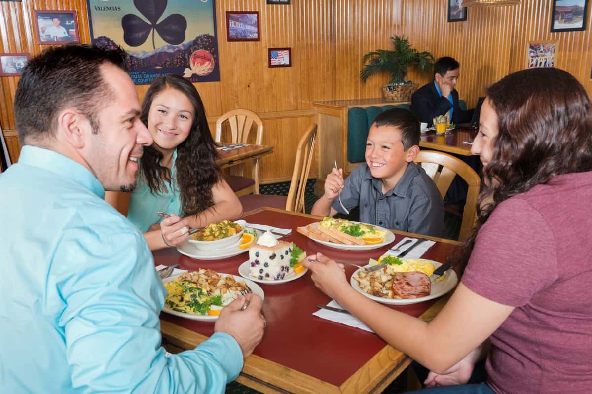 Family dining with children