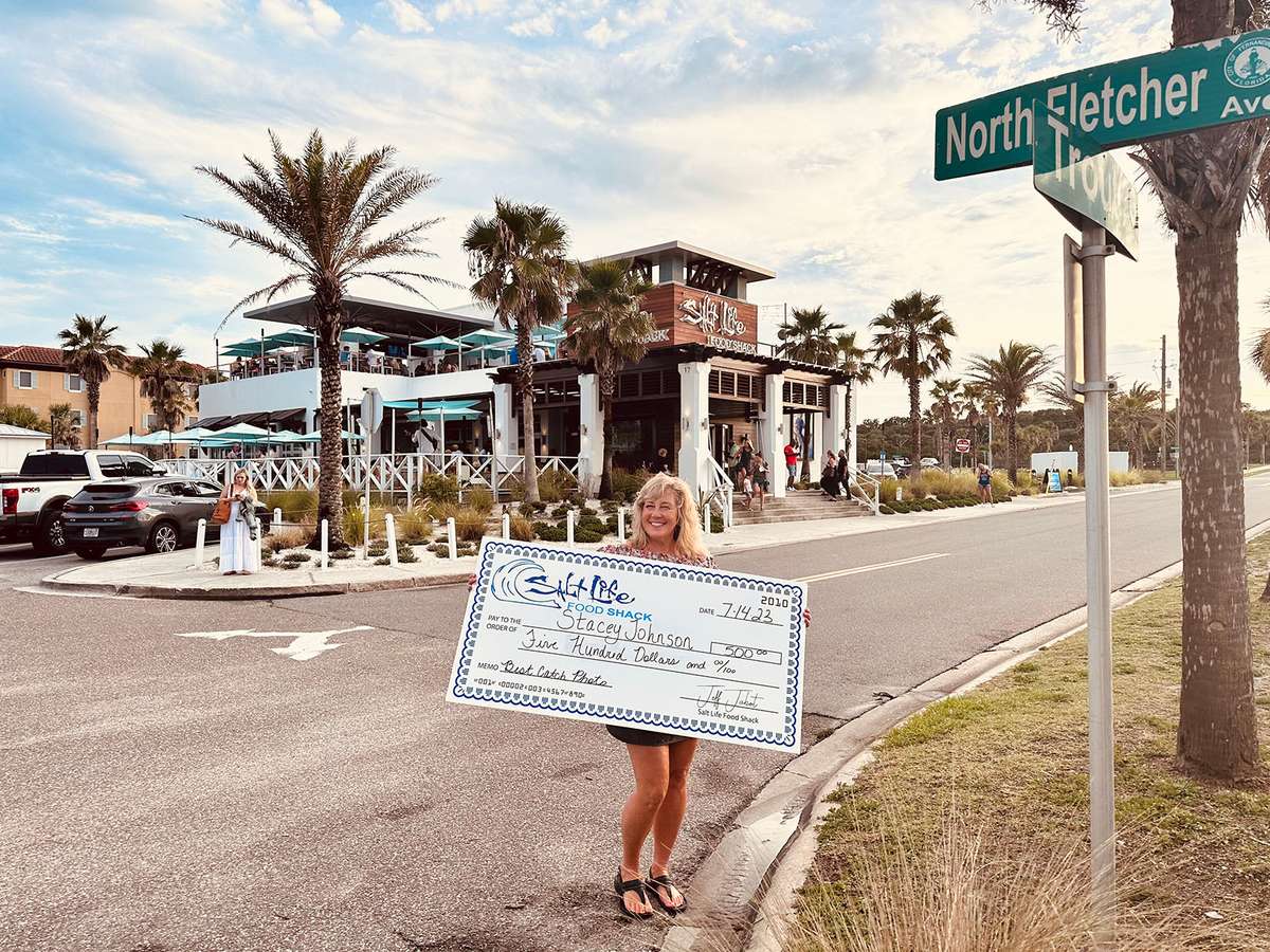 Salt Life Food Shack photo contest winner outside the restaurant