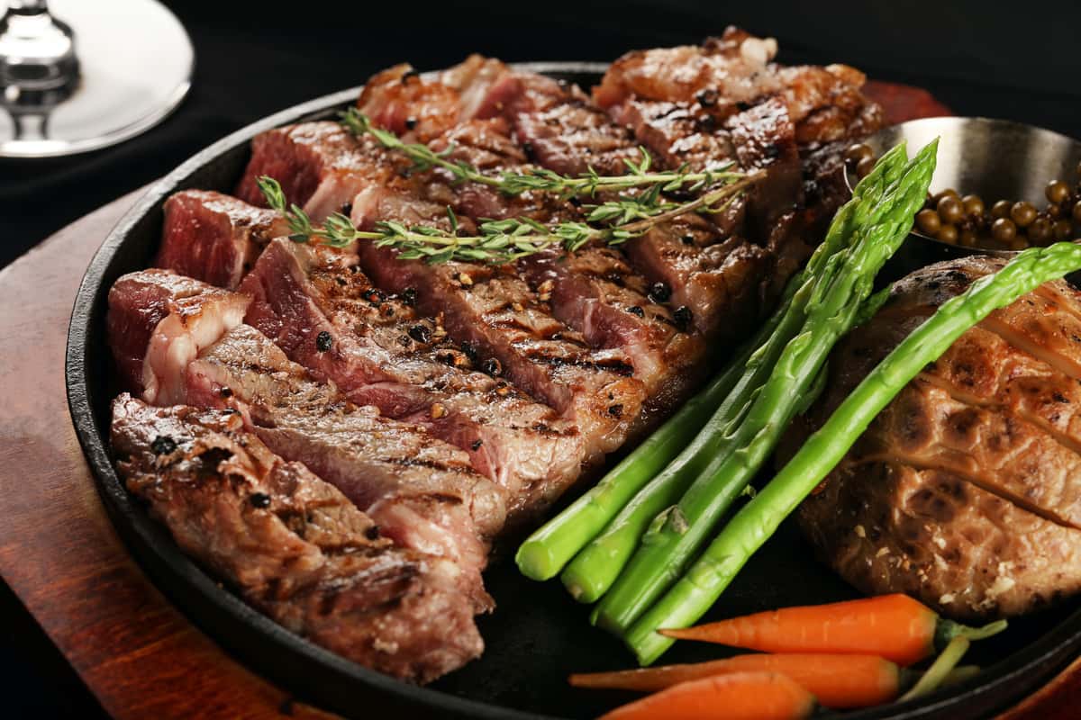 Meat with a side of asparagus