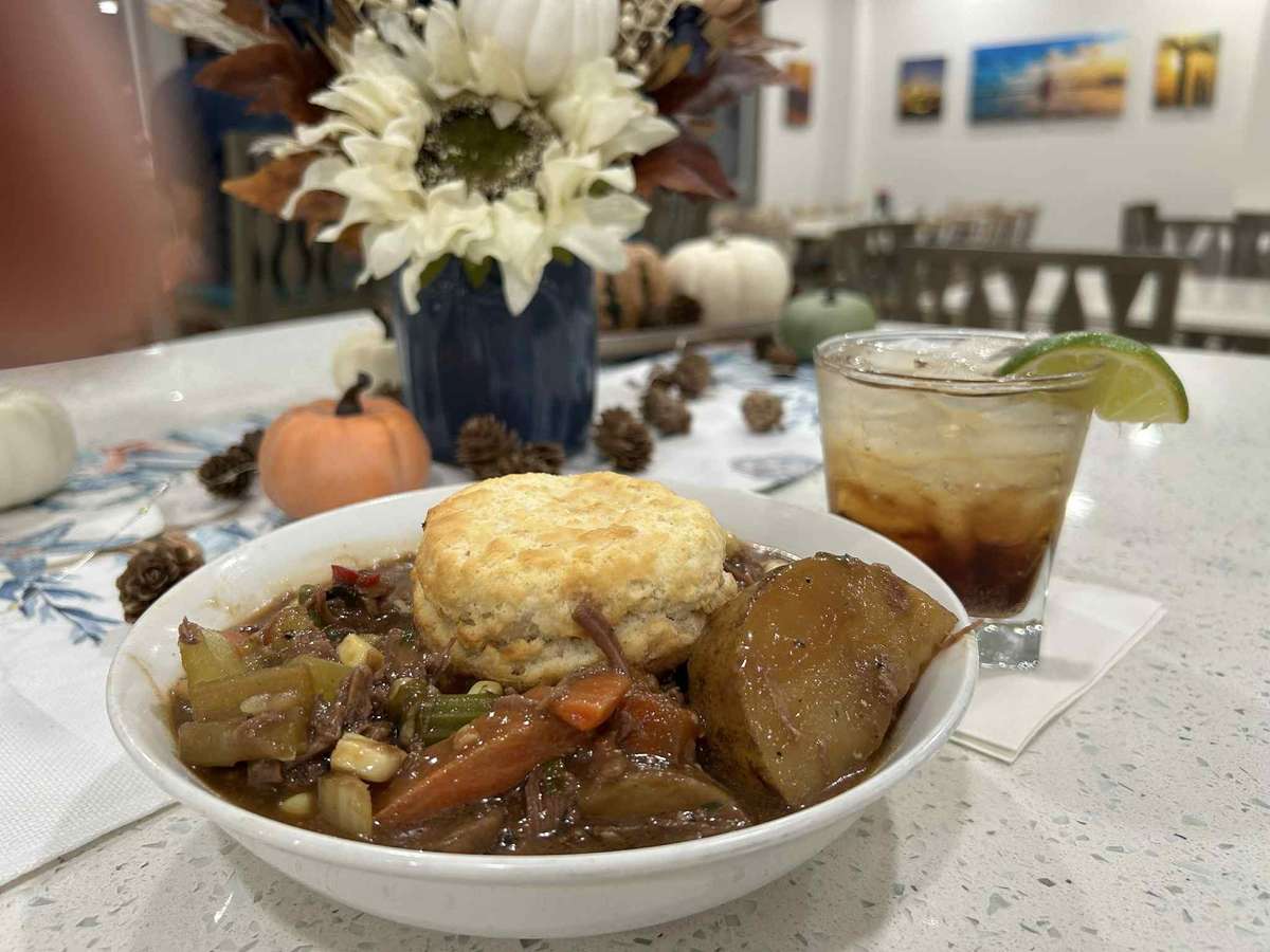homemade Beef Stew served with a fluffy biscuit