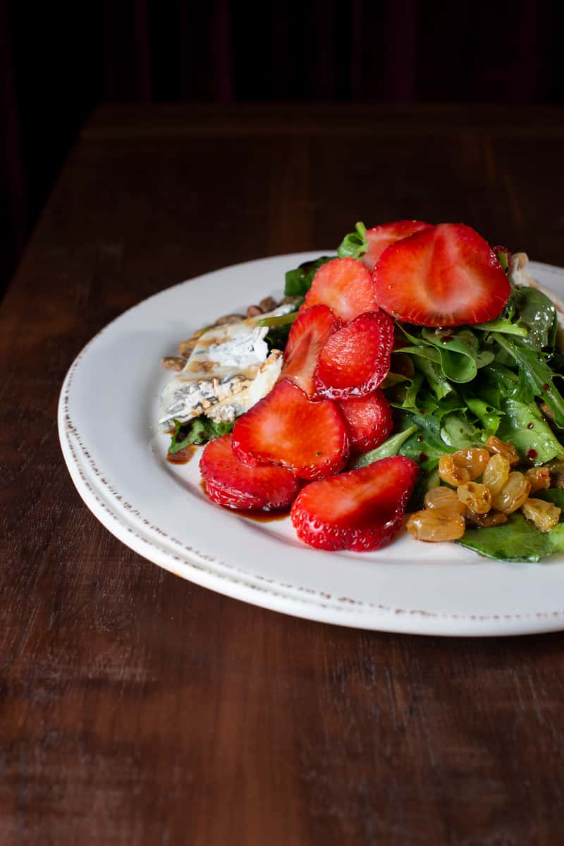 spinach, organic mixed greens, sliced strawberries, pistachios, Humbolt Fog cheese, rum soaked cranberries, saba vinegar and agro-dolce whit balsamic vinegar