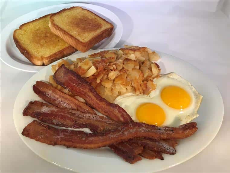 eggs, bacon, hashbrowns, and 2 pieces of toast