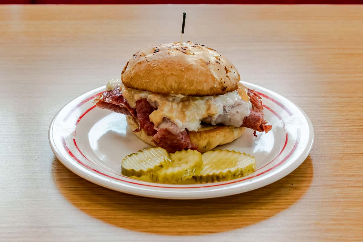 Corned beef, Swiss, Coleslaw & Thousand Island on and onion roll