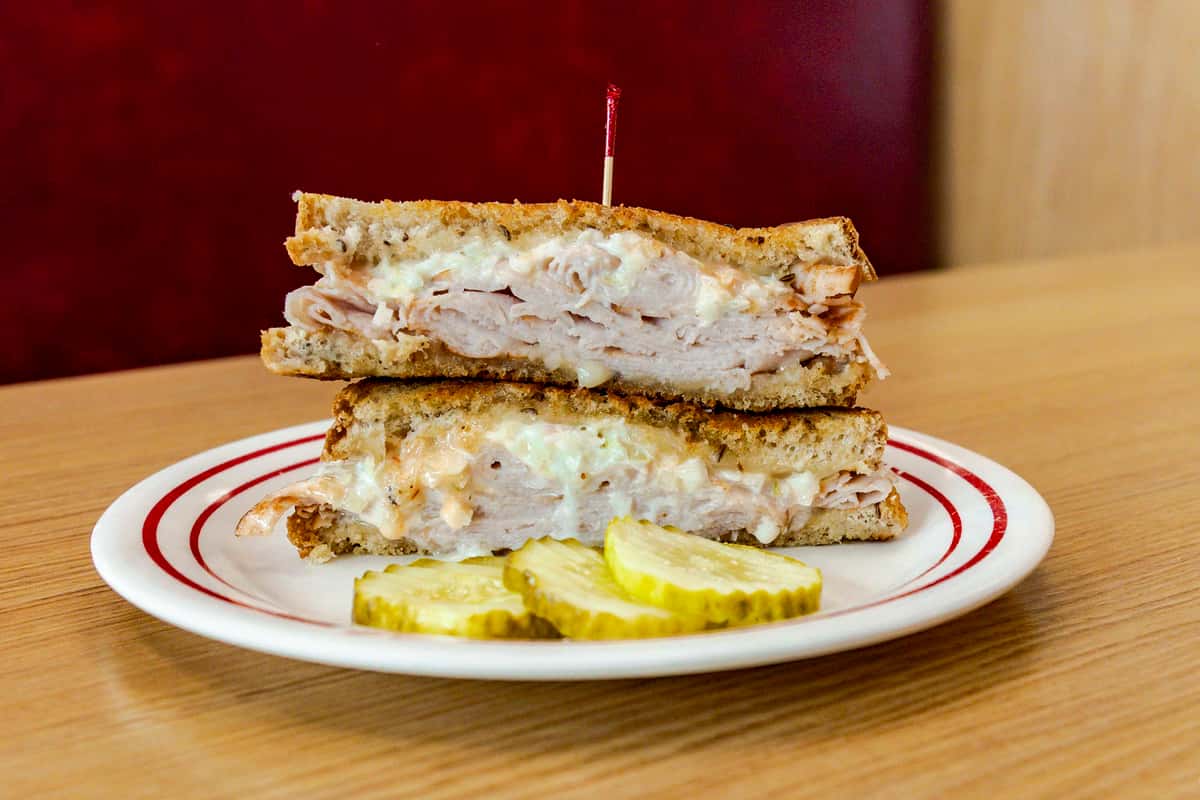 Deli turkey, coleslaw, Swiss cheese and Thousand Island on Rye