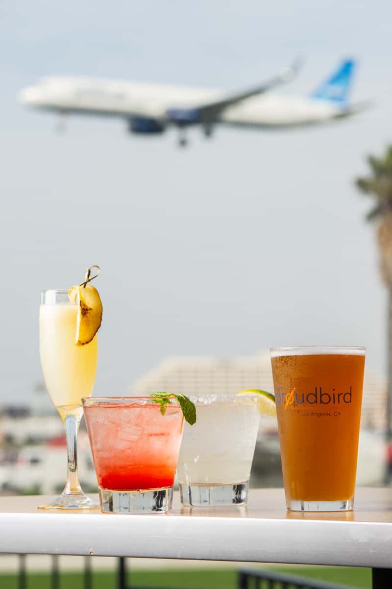 plane landing with cocktails on the table