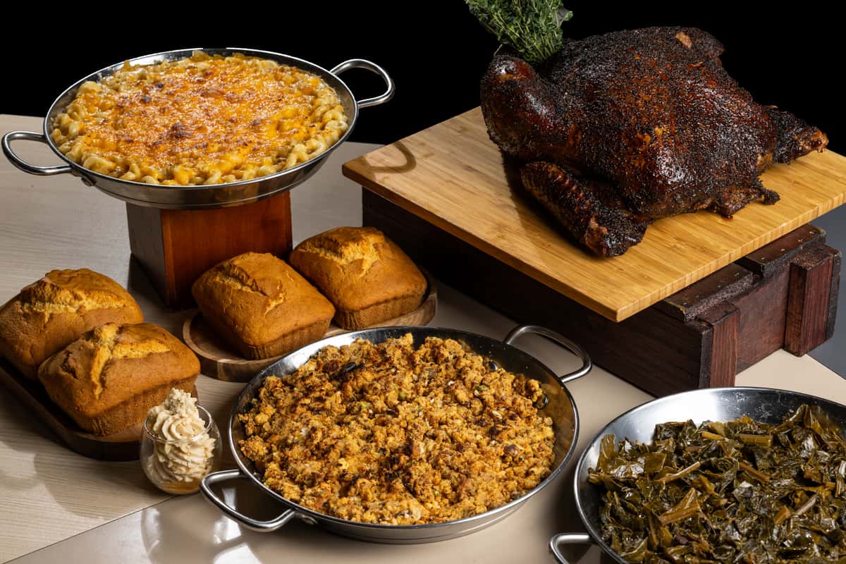 thanksgiving turkey, macaroni and cheese, baked beans, cornbread, and coleslaw