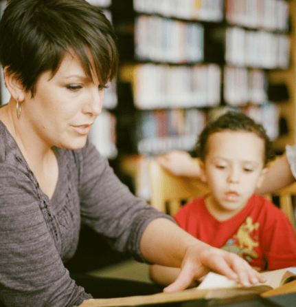 Teacher instructing student