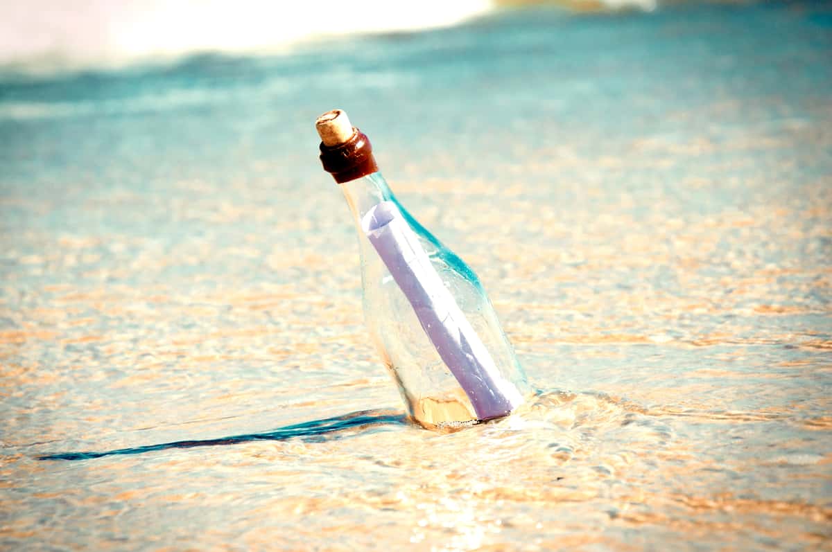 message in a bottle on the beach