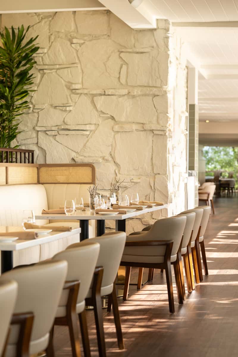 tables and chairs with place setting