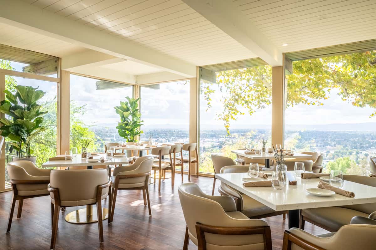 tables and chairs overlooking the valley