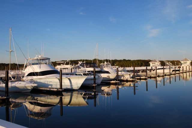 Boats on the water at sunset