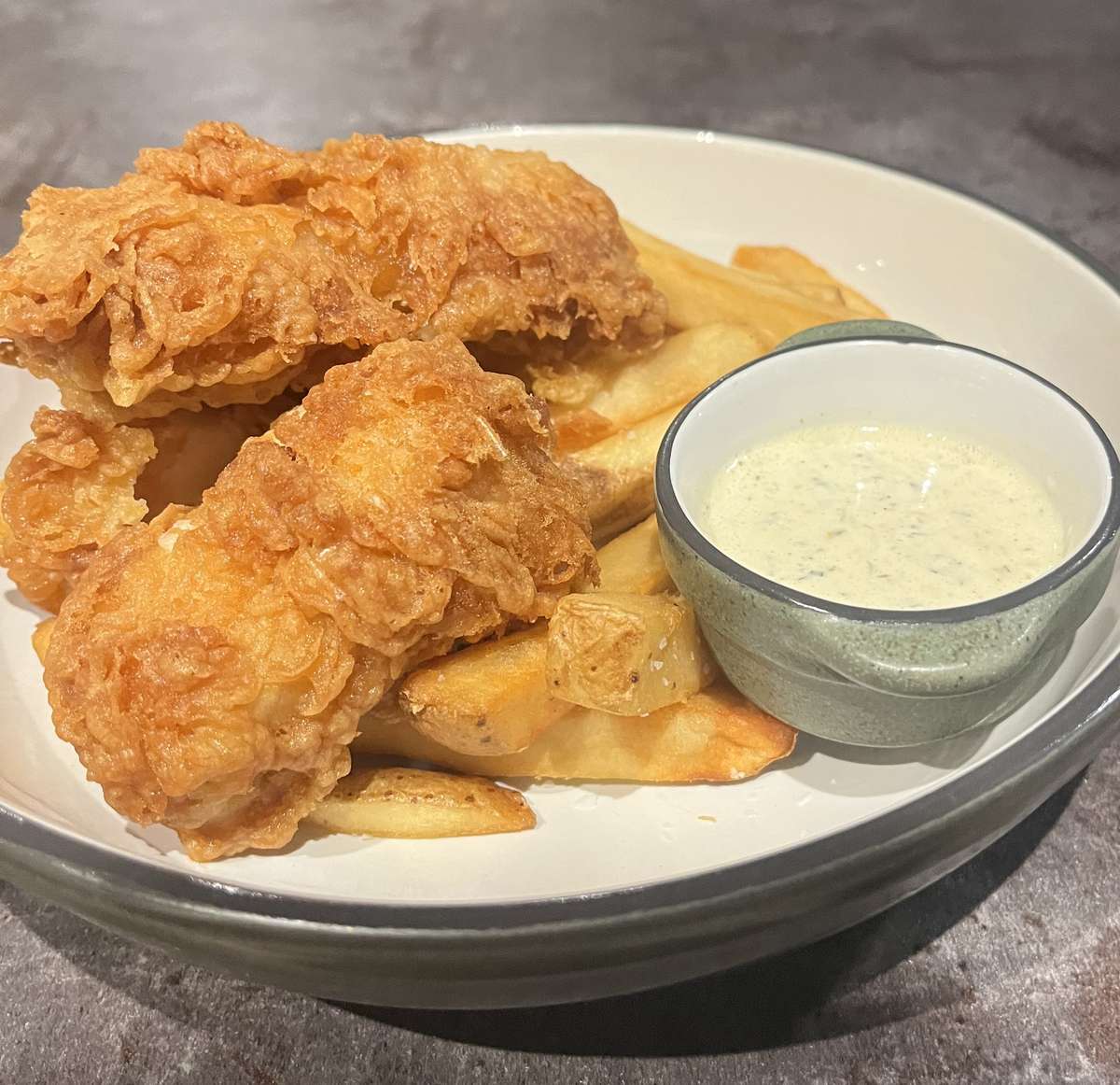 Beer battered cod with crispy fries and housemade tartar sauce at Griff's Kitchen and Bar.