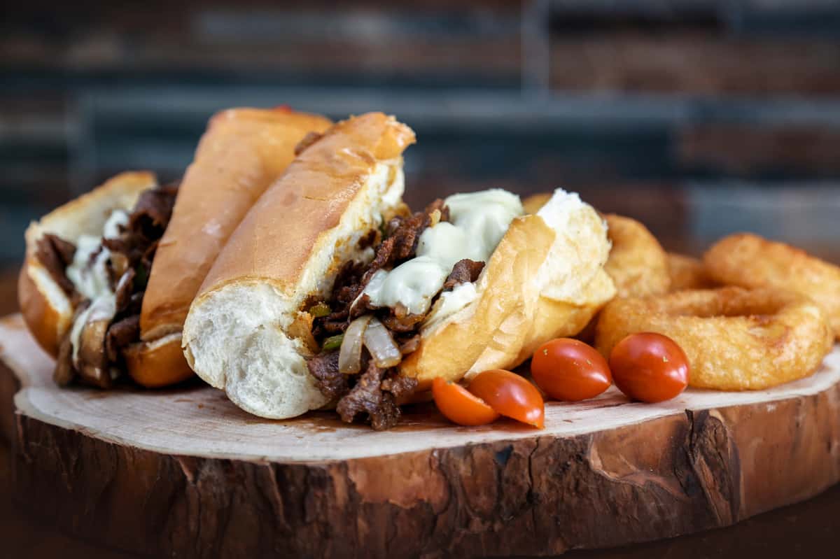 Philly sandwich on a cutting board