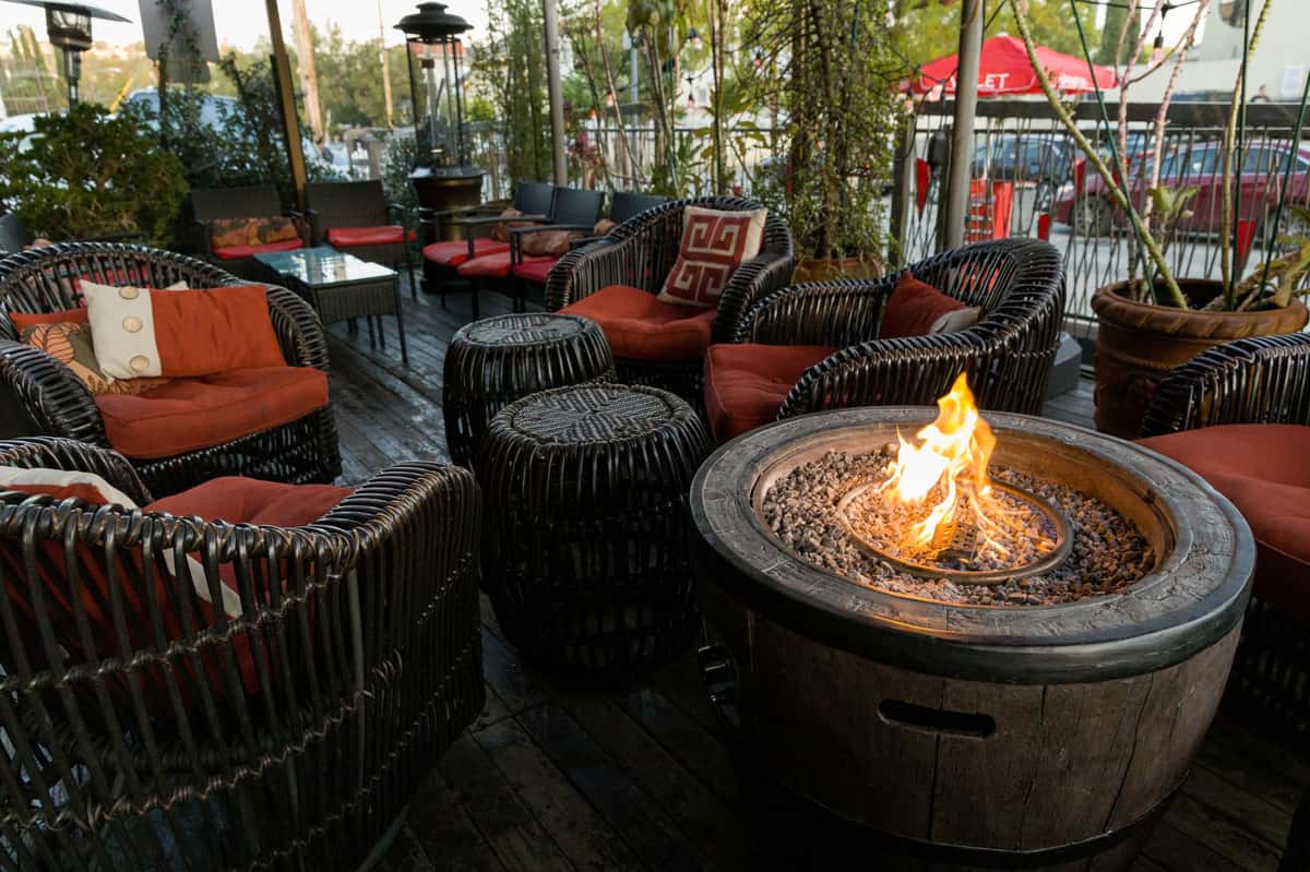 Patio area with tables and fire pit