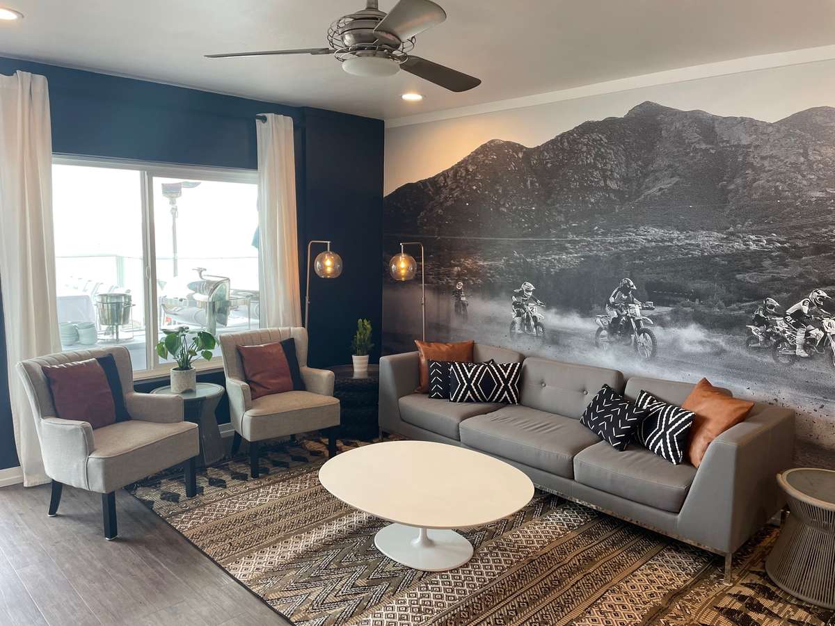 fox bungalow with coffee table couch and wall mural