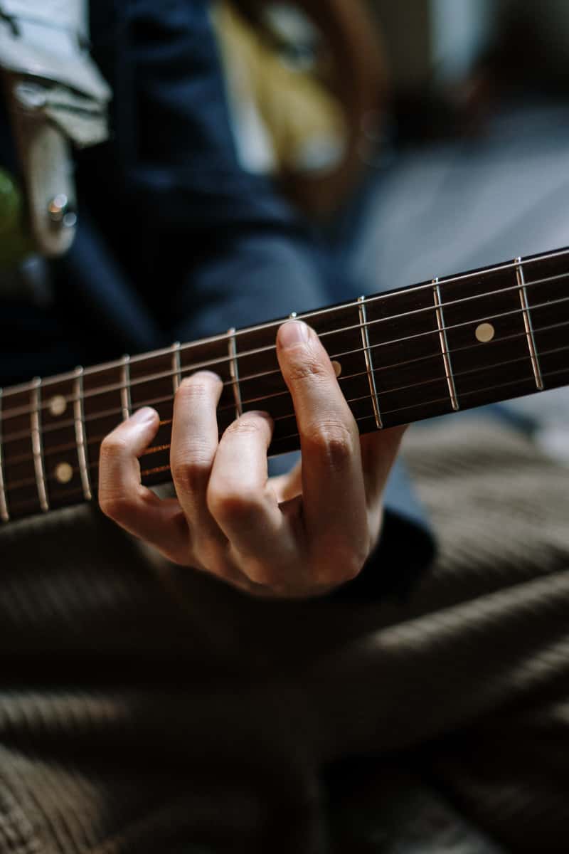 person playing guitar