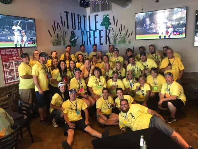 inside turtle creek pub with staff and customers dressed in t shirts for Hydrocephalis Awareness