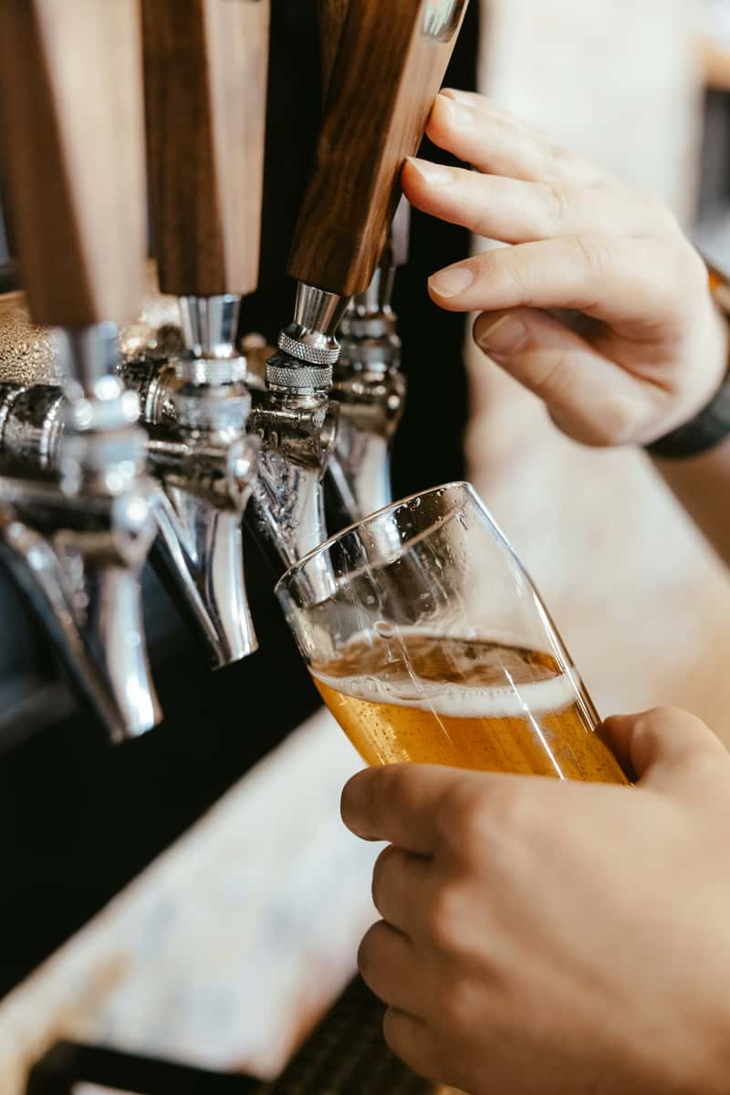 Someone Pouring Beer.