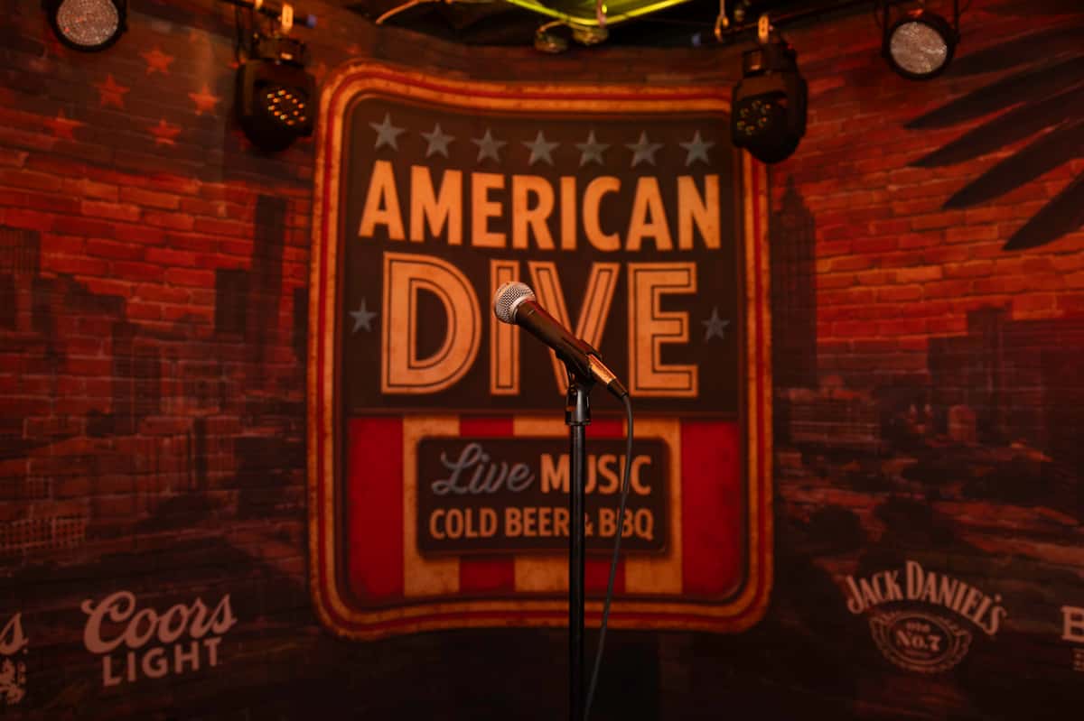 American Dive is a Downtown Atlanta BBQ restaurant and live music bar at 19 Andrew Young inside 207 Peachtree, serving lunch, dinner, drinks, games, and nightly live music starting at 9 pm.
