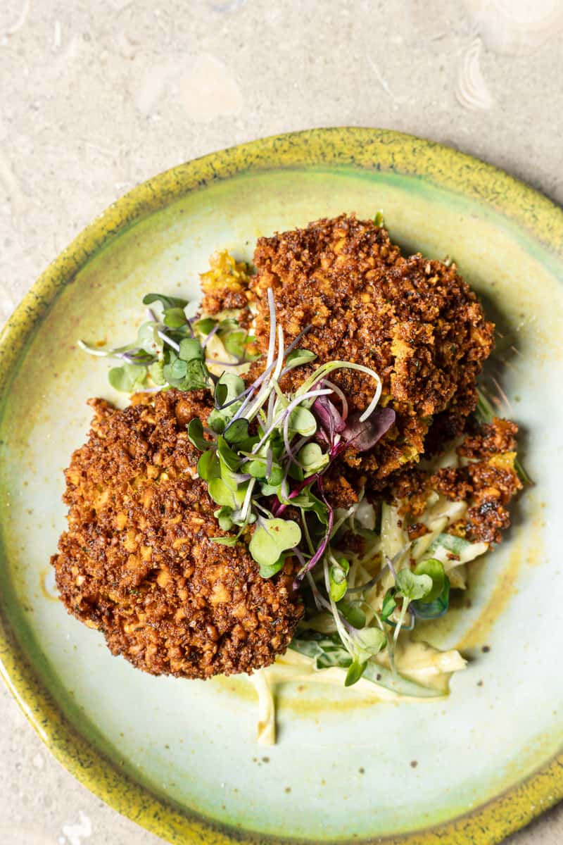 Deep fried ground Chickpeas over Jalapeño slaw