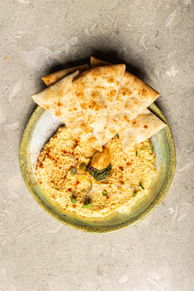 Fresh in-house chickpea, garlic and herbs prepared daily