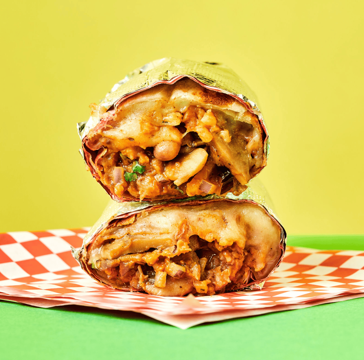 Squash, tomato corn, mojo de ajo, monterey jack cheese, pinto beans, spanish rice, served con-todo w/ onion, cilantro, guaca-salsa and salsa roja

**Vegetarian** For vegan option, please request no-cheese