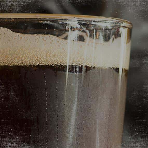 pint of dark beer up close