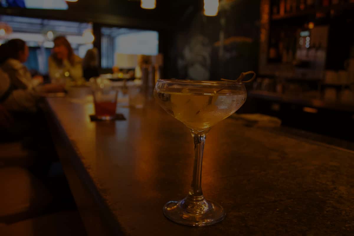 glass of wine at a bar
